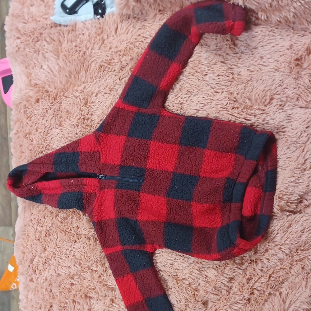 A fuzzy red and black plaid halfway zip up